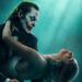 Joker (Joaquin Phoenix) dan Harley Quinn (Lady Gaga) dalam Film “Joker: Folie À Deux”. (forbes.com)