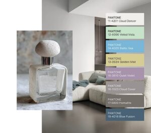 Penerapan Cloud Dancer oleh Pantone sebagai Color of The Year 2026 pada berbagai media warna.