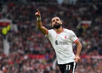 Penyerang Liverpool Mohammed Salah saat selebrasi gol ke gawang Manchester United. (AP Photo/Dave Thompson).