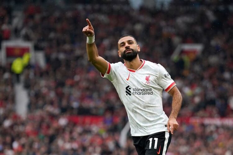 Penyerang Liverpool Mohammed Salah saat selebrasi gol ke gawang Manchester United. (AP Photo/Dave Thompson).