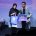 Penerimaan hadiah pemenang pada malam penutupan UCIFEST 14 pada Jumat (12/05/2023) di Lecture Theater, Universitas Multimedia Nusantara. (ULTIMAGZ/Keizya Ham)